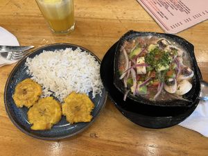Ceviche with Patacones and rice 🍚   at Fer's Grill House in Puerto Baquerizo Moreno