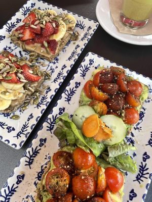 avocado, cherry tomatoes and zataar and the other one is the tahini, miso, toasted seeds, fresh fruits. Both with buckwheat bread so it was gluten free  at DODO in Mallorca