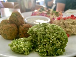 mezze platter - tabouleh, hummus, babaganoush, and apple cabbage current coleslaw at Quinoa in Las Condes