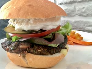 quinoa burger with Yukon gold and sweet potato fritas at Quinoa in Las Condes