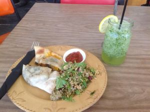 Vegan Calzone with quinoa and white bean salad with a refreshing elderflower,lime, cucumber and mint juice at The Good Loaf Sourdough Bakery and Cafe in Bendigo