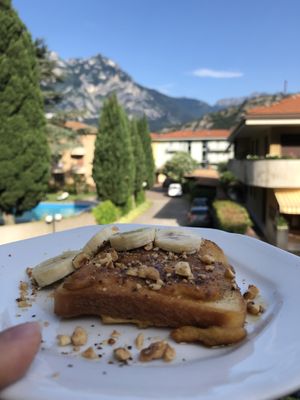 Breakfast outside with a wonderful view at La Casota in Nago-torbole