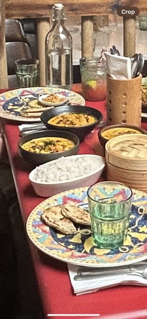(Poor image) but red rice, coconut roti, cashew curry, lotus curry, and lentil curry. String hoppers in basket.   at Machan Kitchen in Croydon