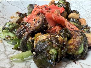 Nice big serving of fried Brussels with teriyaki and pickled ginger and cashews  at Hidden Still Spirits in Hershey