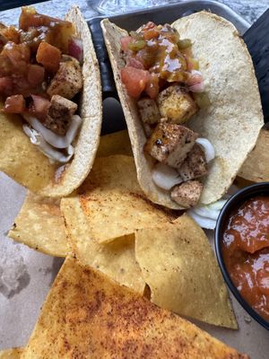Jerk tofu tacos on corn tortillas with more corn tortillas on the sidee  at Hidden Still Spirits in Hershey