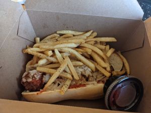Vegan meatball sandwich with fries. To go! at Slice of Vegas Pizza in Las Vegas