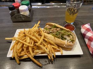 Vegan Chicken Philly Sandwich with Garlic Rosemary Fries.  at Slice of Vegas Pizza in Las Vegas