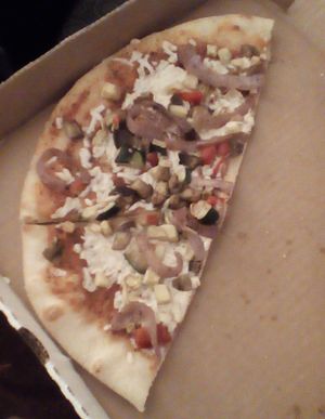 1/2 of the basic vegan pizza, delivered to my hotel. at Slice of Vegas Pizza in Las Vegas