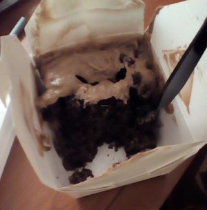 Vegan chocolate cake w/ peanut butter frosting delivered to my hotel. at Slice of Vegas Pizza in Las Vegas