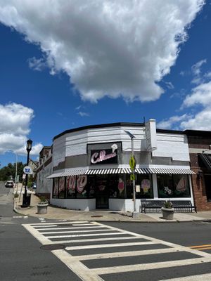 Our little corner of Medford Square! Also location of the Amelia Earhart mural! at Colleen's Ice Cream & Sandwich Shop in Medford