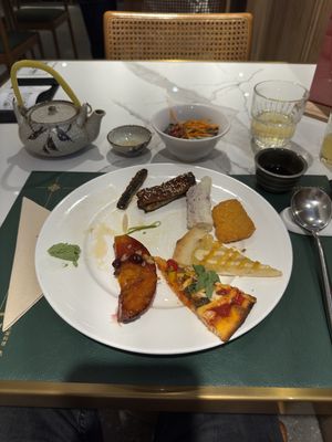 Cinnamon Pumpkin, Durian Pizza, Extra Spicy Noodle-Salad, Nuggets, Eel  at Green Eats in Hangzhou