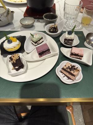 Mango Tarte, Macca, Blueberry, Raspberry, Chocolate, Black Forrest cakes. Chocolate Ball with Mango filling   at Green Eats in Hangzhou