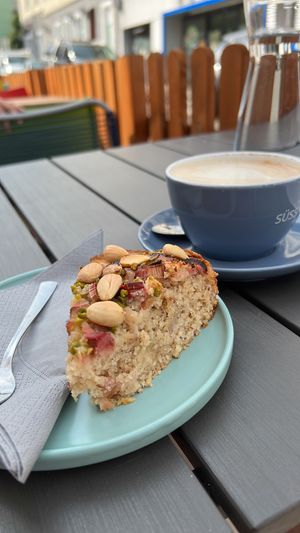Rhubarb and pistachio cake with almonds   at Café IIN in Vienna