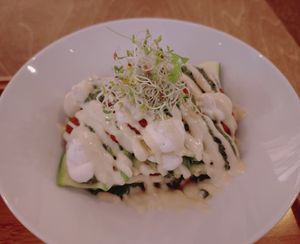 Raw zucchini lasagna with sundried tomatoes sauce, homemade pesto, cheeze sauce and almond ricotta at Yu Dei 余地 in Kowloon