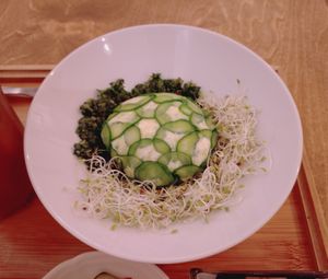 Cucumber dumpling, almond ricotta & melon stuffing, melon and herbed sauce, fresh sprouts at Yu Dei 余地 in Kowloon