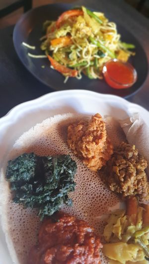 Ethiopian plate and noodle dish with cabbage (not vegan) at Fröjas Sal in Uppsala