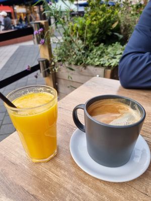 Orange juice and coffee at Kensington Creperie in South West London