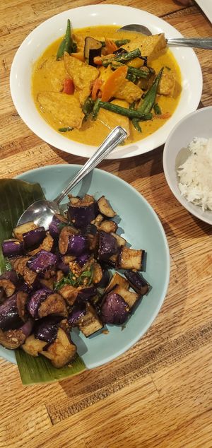 Assam curry tofu & vegetables (top), Wok-fried eggplant & basil at Banana Leaf on Davie in Vancouver