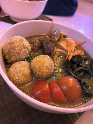 Divine and hearty vegan Ramen with Armenian arishta noodles, "cheese" balls, seitan & aveluk at Aygi in Yerevan