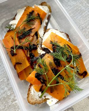 Delivered sandwich with vegan homemade butter and carrot "salmon". Highly recommend! at Aygi in Yerevan