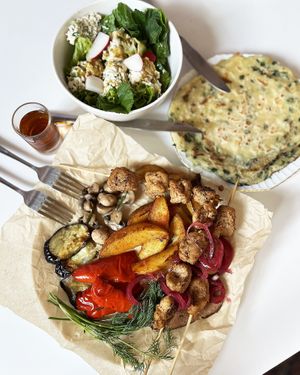 Vegan Haykakan (Armenian) lunch with kebabs, “ham”, vegetables, “egg” salad, fried bread with onions and a cognac. Lunch in honour of one year of chef Dasha’s Armenian e at Aygi in Yerevan