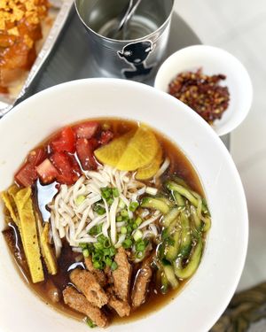 Vegan Kuksi soup with great broth, soy meat, noodles, non-egg crepe, pickles and veggies + spicy'n'sweet addition at Aygi in Yerevan