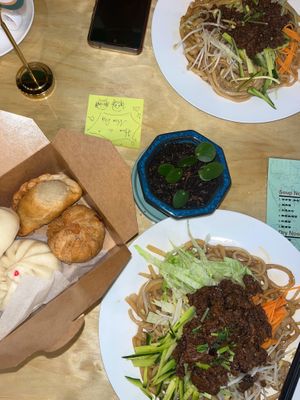 Pulled Noodles with Sesame Sauce (top) and Pulled Noodles with Mushroom (bottom) with Bao buns, curry puff and another pastry to take away at Joyve Cafe in Auckland
