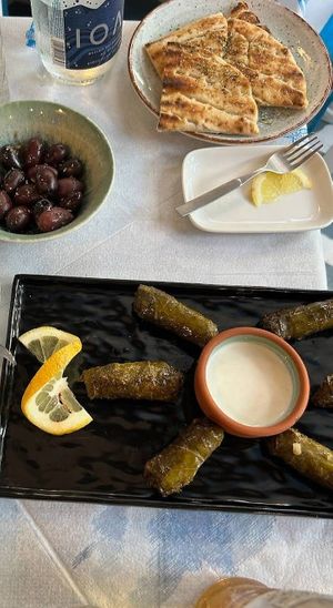 Vegan stuffed vine leaves, olives and pita bread at Meli Restaurant in Rhodes