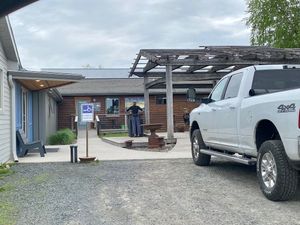 Not the best picture, but there is a pretty large outside space with tables and chairs and accessible parking. at Cafe Wren in Luck