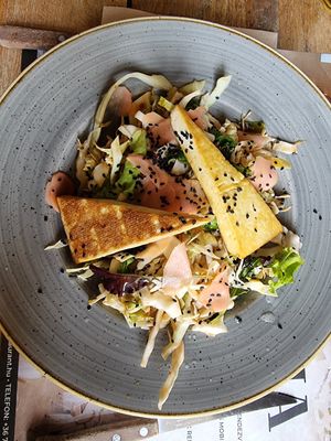Smoked tofu, Korean cabbage salad, sesame seeds at Pannónia Restaurant in Szombathely