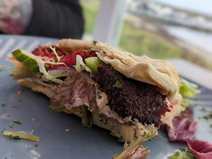Not the best pic but the beetroot flatbread is to die for!! at The Lochside Hotel & Restaurant in Islay