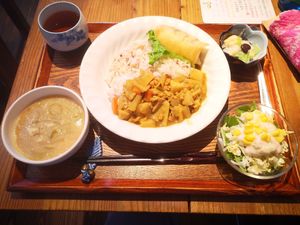 Soy milk soup, rice, curry, spring roll, pickled veg, salad with soy yoghurt sauce at Collaboration Cafeteria - コラボ食堂 in Ueda