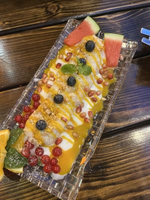 dessert with coconut, mango and melonn  at Padme Hum  in Munich