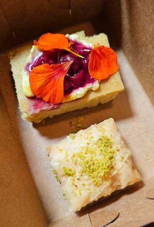 Hareesa and baklawa at Mishmish Souq in Oakland