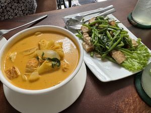 Amok tofu and stirfried morning glory  at Pu Rock Cafe in Phnom Penh