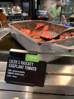 Warm dish with eggplant on tomato sauce   at PRG - Marché Mövenpick in Prague
