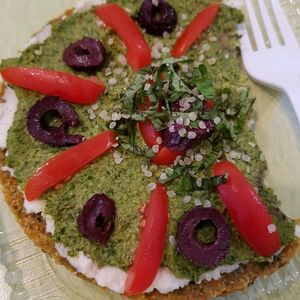 Mouthwatering raw greek pizza at Ionie Organic Cafe in Sarasota