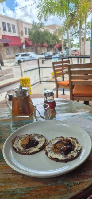 Chakra Tea and Banana Pancakes with Cashew Cream and Pekan nuts at Ionie Organic Cafe in Sarasota