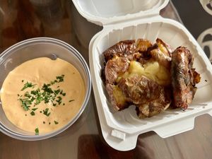 CRISPY SMASHED SALT POTATOES - make sure to ask them to substitute vegan mayo for the cherry pepper mayo sauce   at Vine and Fig in Rome