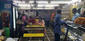 Inside (no doors. Right off street) at Madhur Milan Cafe in Varanasi