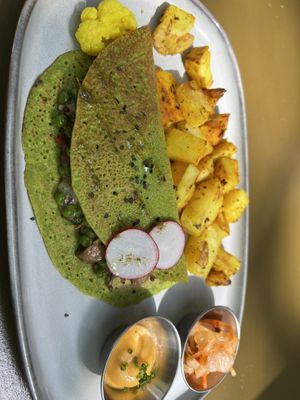 Chickpea omelet w peas mushroom and cheese   at Morgentau. in Barcelona