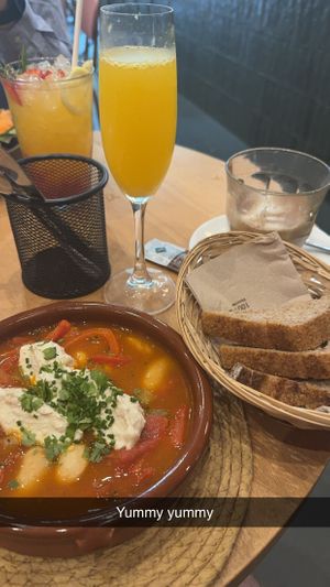 A Shakshuka that tastes of home wherever you're from, mimosa and lemonade.   at Morgentau. in Barcelona