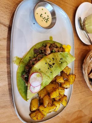 Pea mushroom Omlette with potatoes at Morgentau. in Barcelona