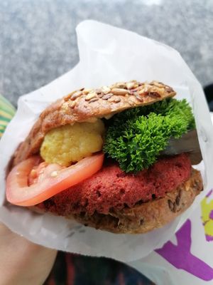 Vegan Oat Patty Sandwich, delicious & fresh, (with cauliflower, tomato, eggplant, parsley and some sauce). Great vegan options here! at FRA - Superfood - T1 in Frankfurt
