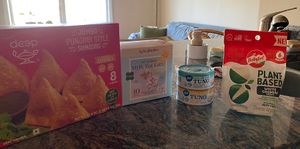 some vegan goodies including vegan samosas, tuna, babybel cheese, and tea lattes  at Ghent Grab & Go in Norfolk