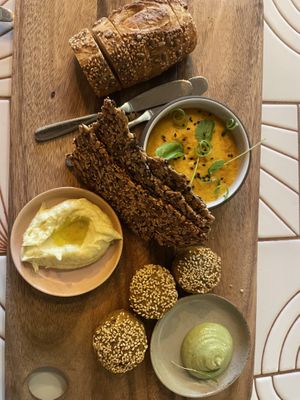Miso squash spread, falafel w tahini, and leek confit with bread and crackers   at Livbud Cafe in Seattle