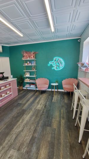 inside with a couple counter top seats at Flourhouse Bakery at Mike & Patty's in Newton