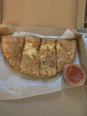 Cheeze calzone w/ peppers + onion at Catalina's Pizza in Malden