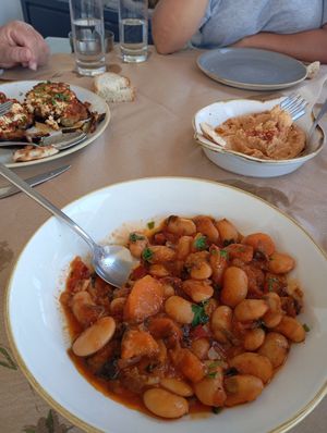Beans and hummus ( on the left is a vegetarian dish called imam) at O Aetos - Ο Αετός Restaurant in Pylos
