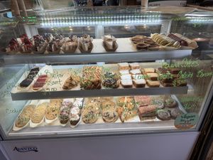 Yes, this is all vegan! Cheesecakes, stuffed cookies, croissants…all of it.  at Vegan Scoops in Orlando